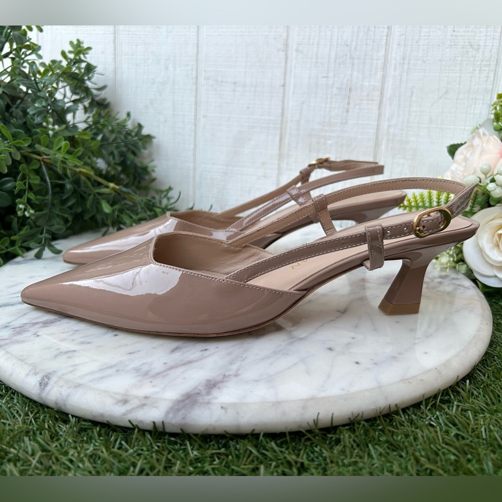 Stuart Weitzman
Vinnie Patent Kitten Slingback Pumps
$525
50mm BEIGE 6.5B NEW - Picture 12 of 16